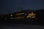 BNSF 7918 with BNSF 7506 in front of her light up their BNSF Swoosh Logo in this Dusk photo as DPU units behind BNSF 7204 that leads this Z-Train west.